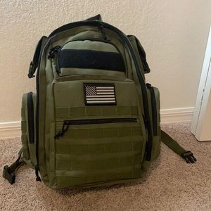 Dark green tactical diaper bag. Great for moms or dads!